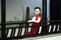 Chinese cheongsam model in Chinese classical garden